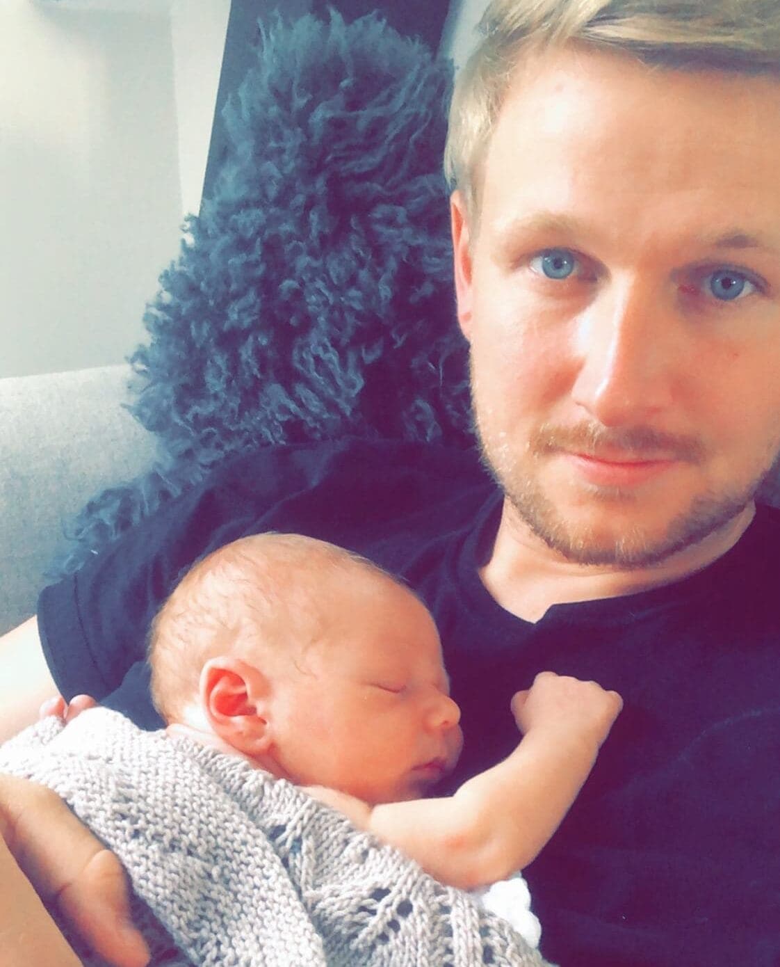 Kasper with his son Oskar asleep on his chest